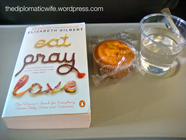 Enjoyed my muffin while reading Eat Pray Love on a flight to Singapore - of 