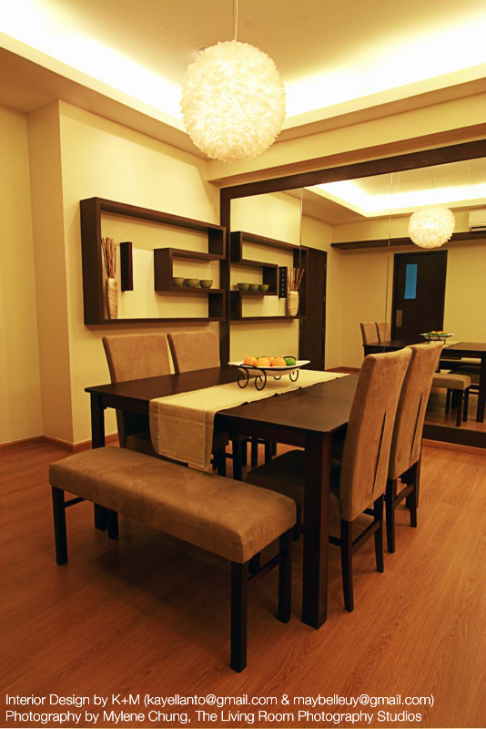 Dining room with expandable table, capiz drop lamp and wine rack wall fixture